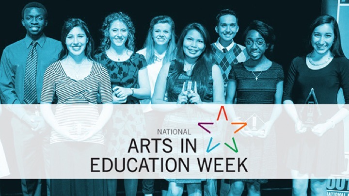 Group of smiling students with text: National Arts in Education Week.