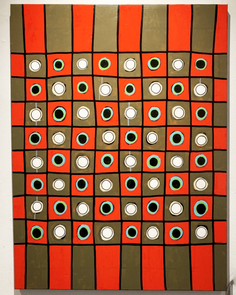 Multi-colored painting of a konane game board