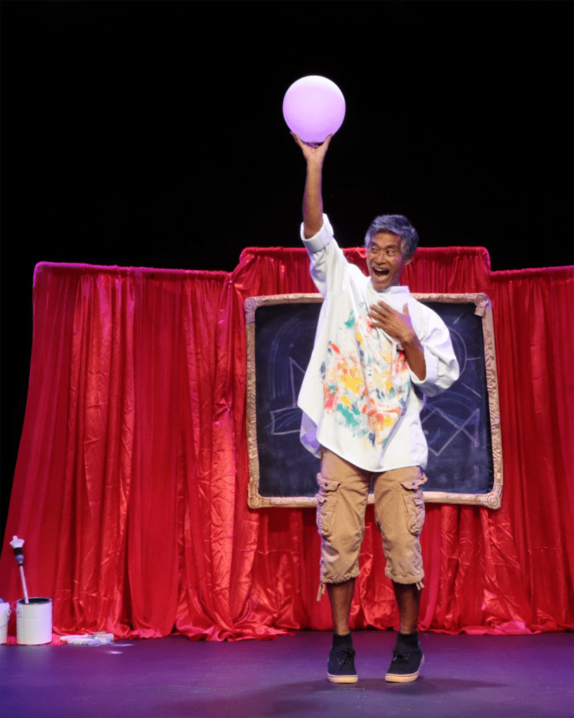 Performer continuing to pretend to be lifted off the 