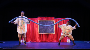 Two performers on a stage