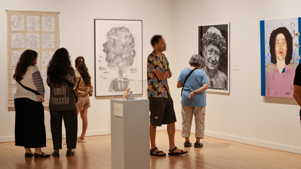 People in a museum gallery.