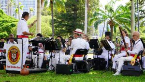 Royal Hawaiian Band performing outdoors at Iolani Palace. Photo credit: Iolani Palace.