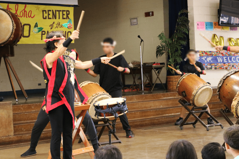 Students performing with Taiko Hawaii